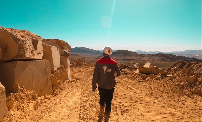 An LMC worker walking through the quarry